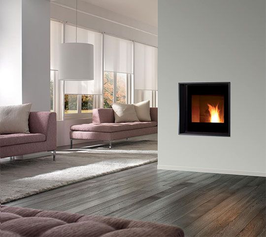 Le charme d'un insert à granulés dans l'intérieur d'une maison Le charme d'un insert à granulés dans l'intérieur d'une maison